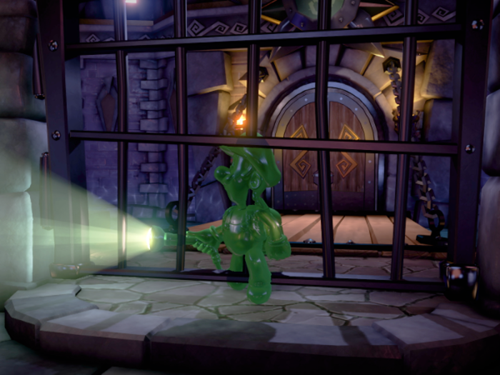 Luigi can also deploy a slimy clone of himself named Gooigi to slip between fences and avoid traps.