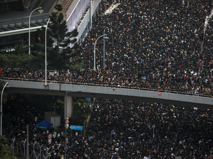 That created a "sea of black" that has cloaked the streets of the Asian financial hub.