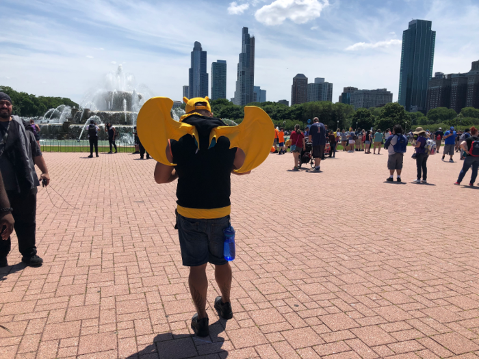 This trainer was wearing a Charizard hat and had wings on his back.