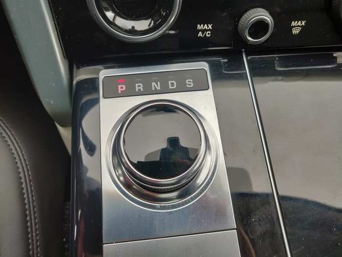 The eight-speed transmission is quite smooth. The gearshift selector is this large knob that rises from the console when the vehicle is fired up and retracts when it