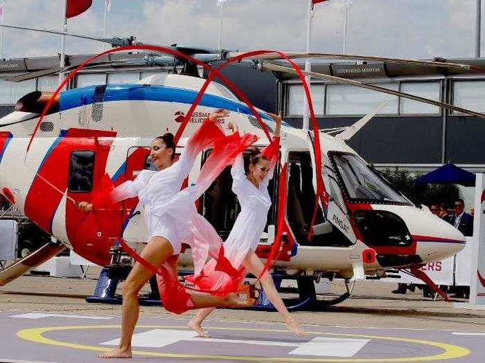 Russia shows off its multi purpose Ansat helicopter — and ribbon dancers.