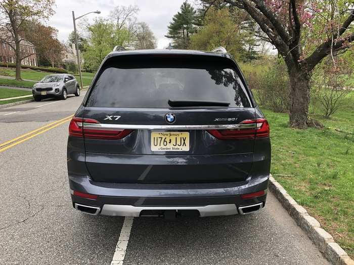 BMW has tried to mitigate the massiveness with tail lights that look far better than the headlights, a nice swath of chrome, and those cool exhaust pipes. But ultimately what we have here is a great big door.