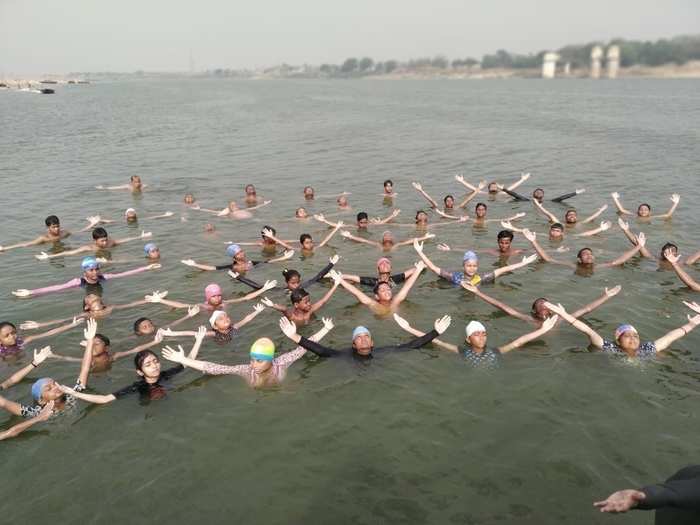 Prayagraj: People practice yoga asanas on International Yoga Day 2019 at Yamuna river in Prayagraj.