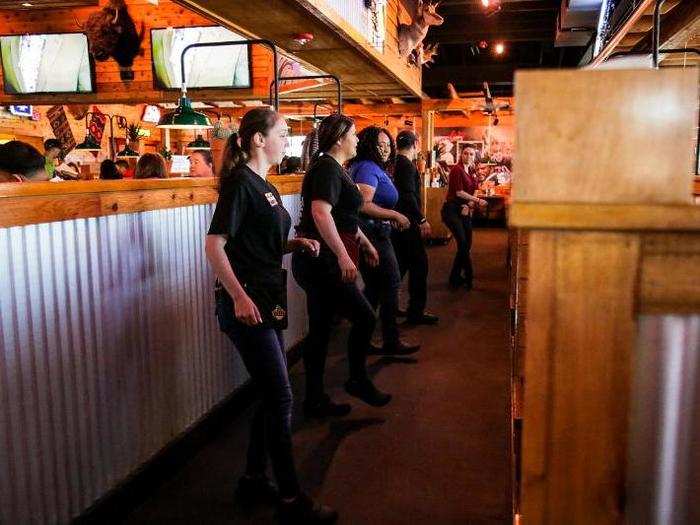 Dinner at Texas Roadhouse also comes with a show. Every night, the staff will perform a line dance for the guests at least once.