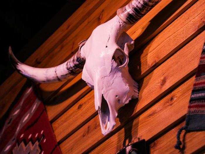 Texas Roadhouse certainly goes more all-out with its decor. The hanging skulls, taxidermy heads, and Native American tapestries certainly took some effort to acquire.