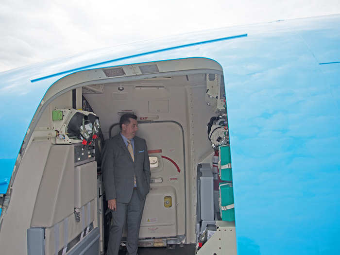 Crew enter the plane by the smaller side door, where they enter a space between the cockpit and the cargo hold.