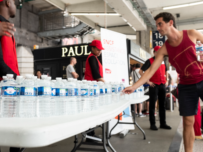 And water bottles are being distributed at train stations.