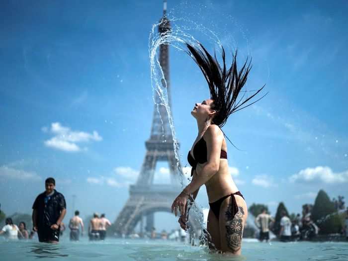 Even though temperatures reached 90 degrees Fahrenheit in Paris on Monday, people seemed to be enjoying themselves.