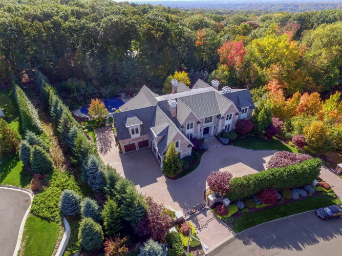 The estate spans 1.8 acres.