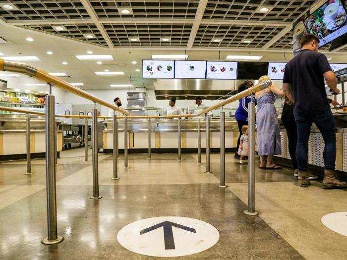 An arrow painted on the floor made clear the path forward. I crossed the threshold into the cafeteria.