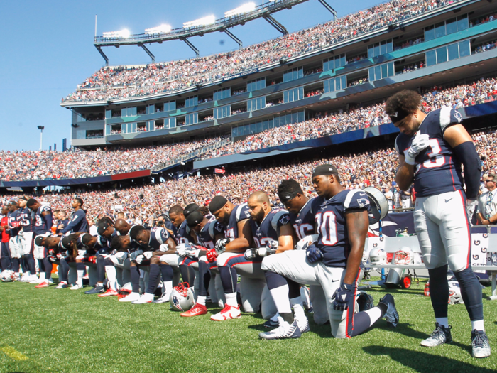 2017: NFL players kneel in protest of President Donald Trump and social injustice.