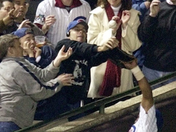 2003: Steve Bartman deflects foul ball in the NLCS.