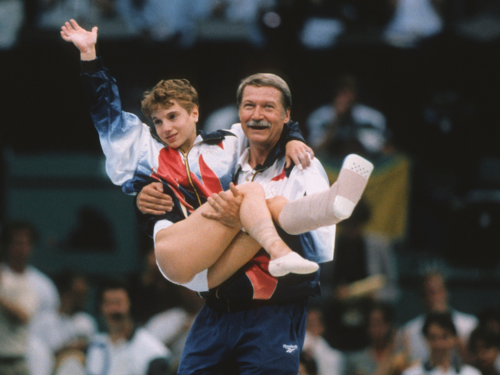 1996: Kerri Strug wins gold on an injured ankle.