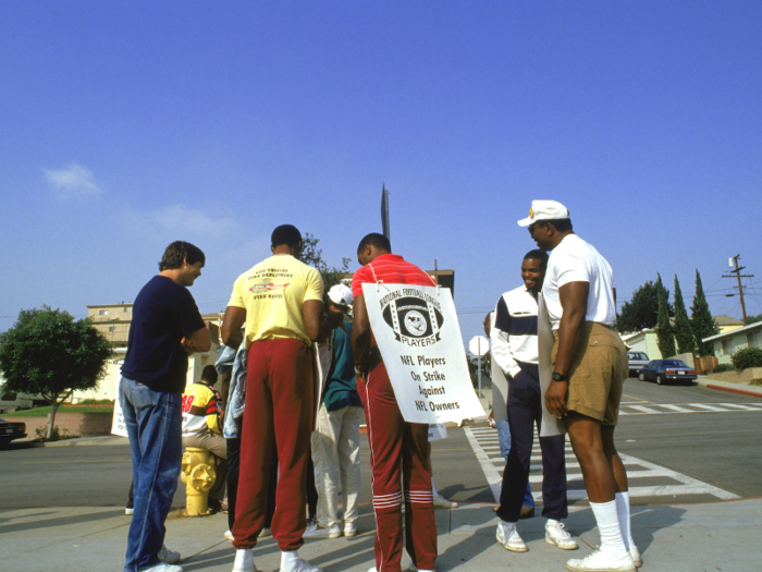 1987: NFL players strike for 24 days as NFL teams hire replacements.