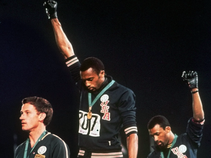 1968: Tommie Smith and John Carlos do the black power salute at the Mexico City Olympics.