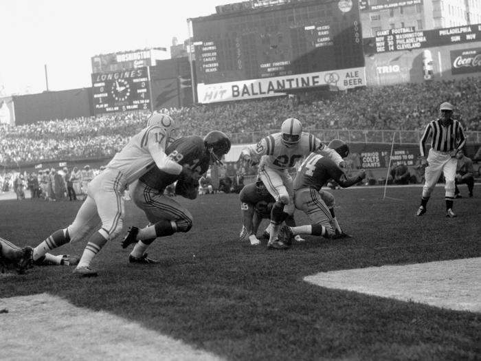 1958: The Baltimore Colts and New York Giants play "The Greatest Game Ever Played."