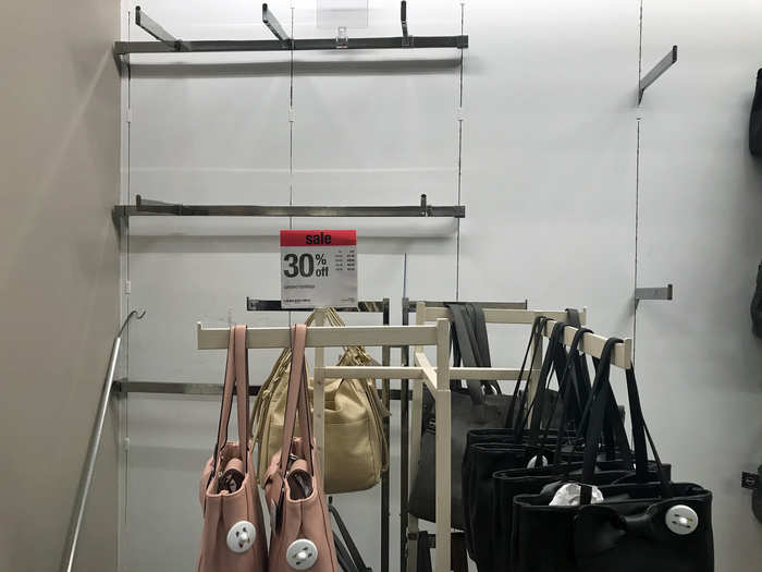 The first thing we noticed was there were several empty racks throughout the store. Here was one we spotted in the accessories department.