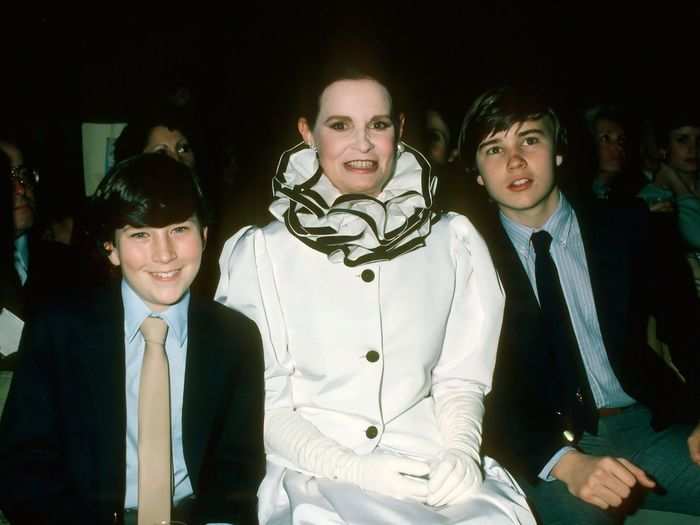 After his father died, Anderson and brother Carter were often pictured alongside their mother at public appearances.
