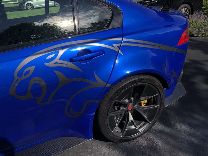 My tester came bedecked in some leaping feline livery stickers. It also had racing stripes, a low-slung carbon-fiber front splitter, racing-spec Michelin tires, and ...