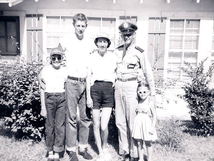 Warren had three older brothers, all of whom later served in the military.