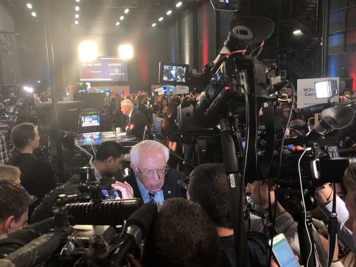 But when Sen. Bernie Sanders came into the room, he was immediately surrounded. Sanders is one of the top-ranked candidates.