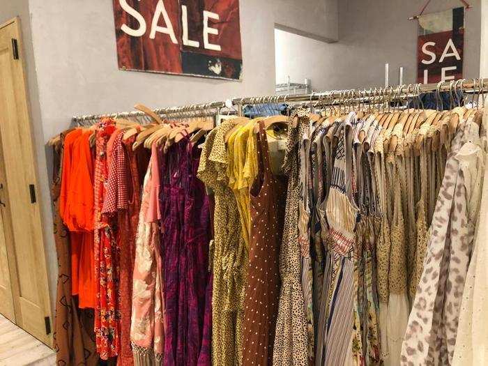 The clothes in the sale room were arranged by color. There was a bunch of cute items to choose from — and with up to 70% off certain items, the price was right.