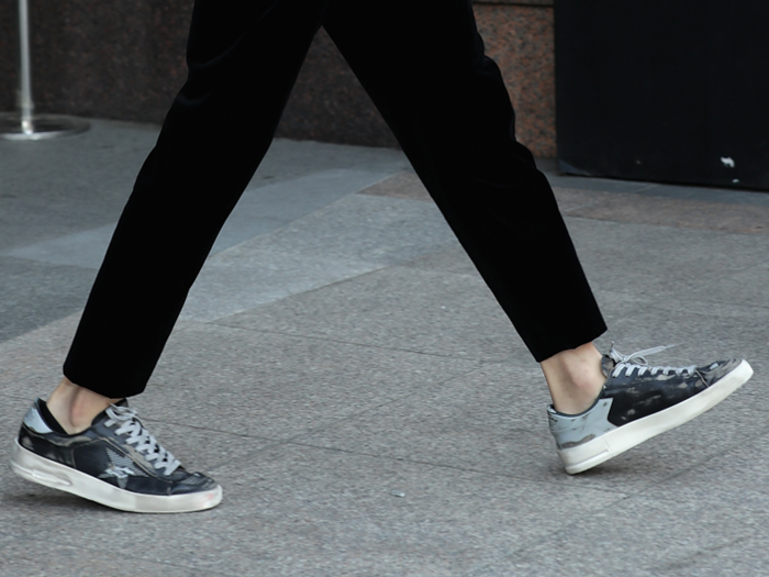 College students flaunt their status on campus with Golden Goose sneakers ($500 and up) and MZ Wallace backpacks ($285 and up).