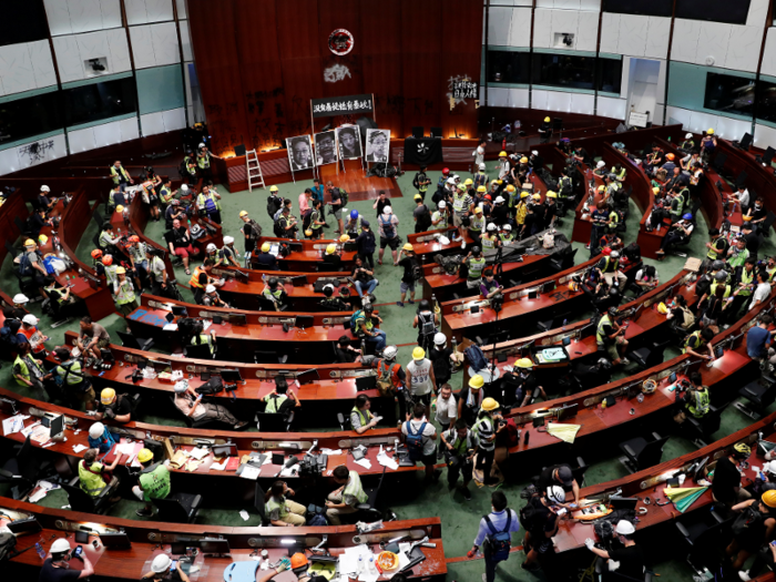 Within the legislative chamber, hundreds of protesters gathered in an act of defiance against the government and Chinese influence.