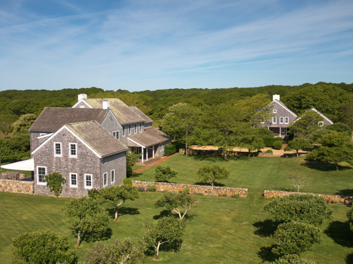 The estate now includes a two-story guest house, two garages, caretaker