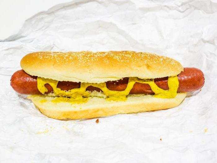 HOT DOG, $1.50 — Along with pizza, their partner-in-cholesterol-crime, hot dogs are the calling card of Costco