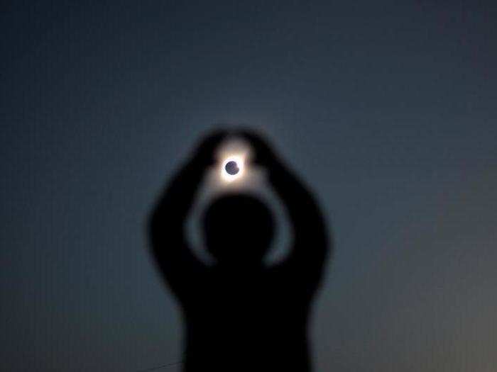 When the moon was fully covering the sun, the skies darkened, making the afternoon briefly look like twilight. The solar corona kept some light in the sky, though.