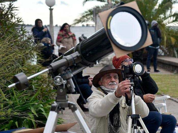 Some people brought telescopes and cameras.