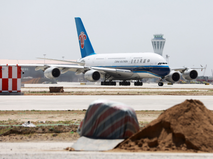 There will be six major test runs with takeoffs and landings before the airport enters service, according to Bloomberg. The first of these took place on May 13, with aircraft of varying sizes from Air China, China Southern Airlines, China Eastern Airlines, and Xiamen Airlines participating.