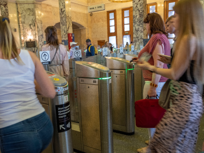 The Moscow metro uses a contactless system, so you just hover your ticket or Troika card over the sensor, the doors open, and you pass through.