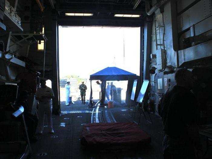 Visitors entered the Dunham through one of the hangar bays. On the deck can be seen one of the platforms on which the ship