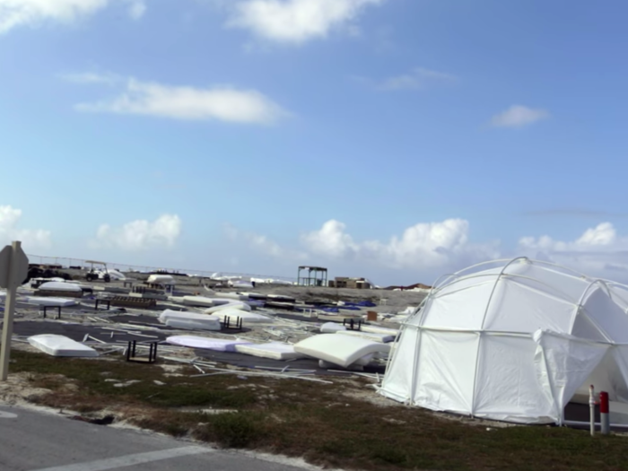 Instead of luxury tents, guests were shown emergency hurricane tents and had to fight to get mattresses to sleep on.