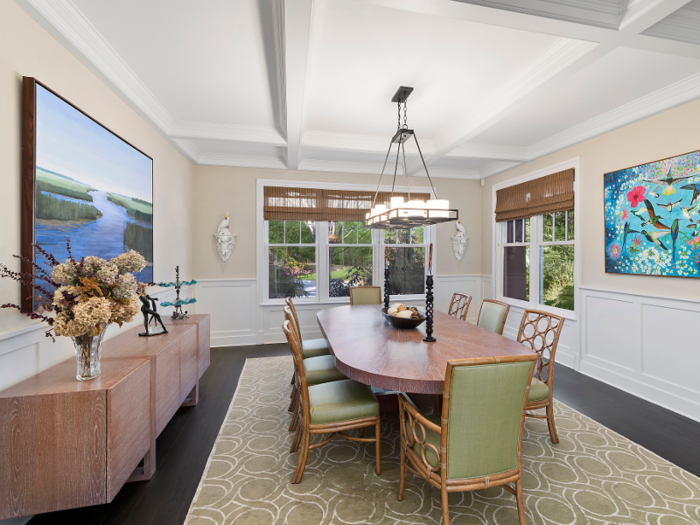 A formal dining room seats at least eight people.