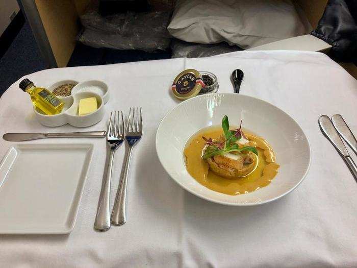 For the appetizer, I had the "gâteau style of homard and its consommé gelée," or lobster served in a gelled stock, which was served with caviar. The lobster was tasty, but the texture wasn