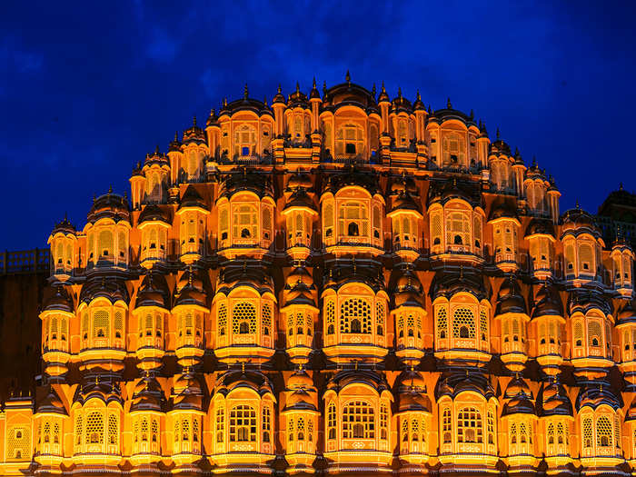 Hawa Mahal meaning the Palace of Winds has 953 windows known as Jharokas, built for the royal ladies to see the life around the city.