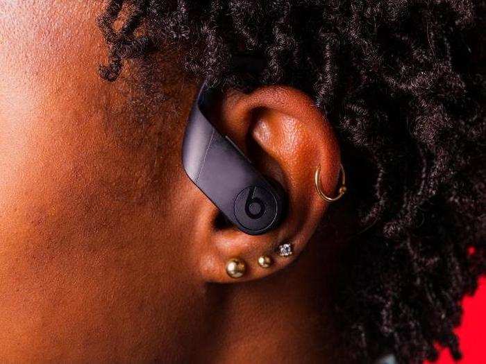 The ear hooks are a smart design choice. They keep the headphones in your ears at all times, but the shape of the hooks is also an easy way to remember how to put them in. Just put the bud in your ear, then rotate the hook until it slides over the top and back of your ear. Once you get the hang of it, it