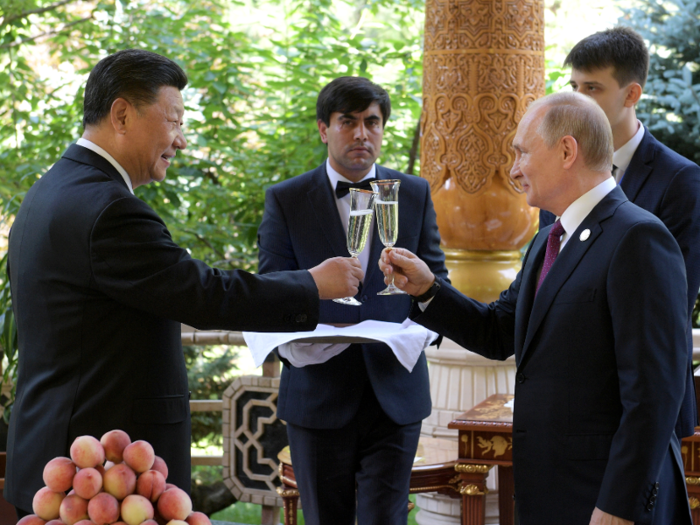 The leaders also toasted with Champagne ...