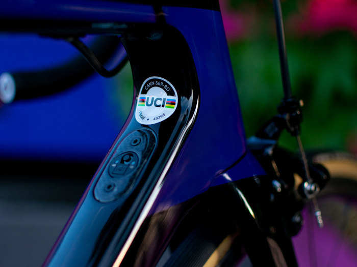 The Di2 junction box, used to charge the electronic gear-shifting system, is designed into the frame. (The UCI sticker indicates the bike is approved for racing by the world governing body of cycling.)