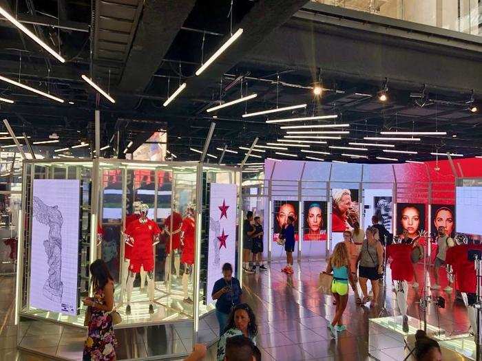 The main floor of the store was decked out in screens featuring female athletes from different countries.