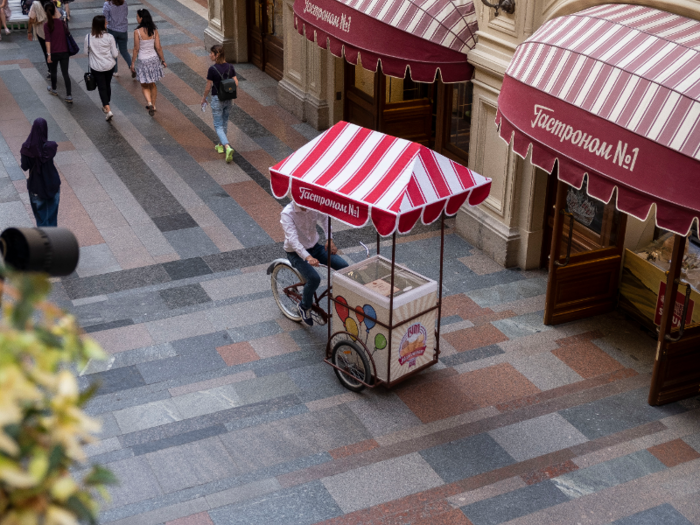 An employee riding an ice cream bicycle added to the whimsical feel of the department store.