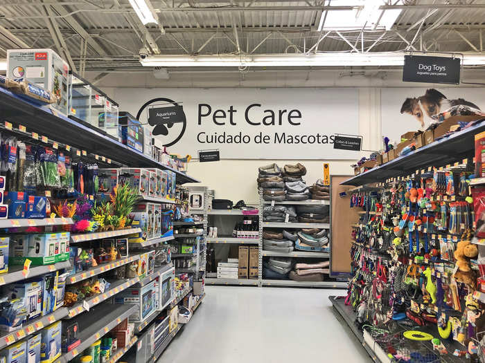 Looking at the "Pet Care" sign in the back of Walmart, we noticed it was also written below in Spanish. Every area marker in Walmart had dual-language signage.