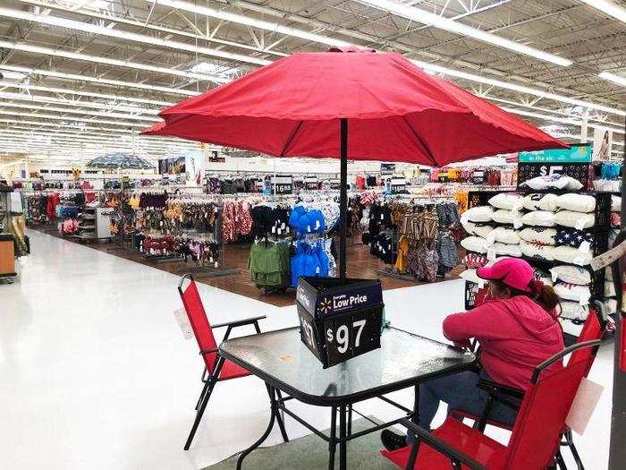 Next to some of the clothes at this Walmart Supercenter location was a set-up featuring outdoor furniture. Both stores had their own versions of outdoor supplies sections, so there wasn