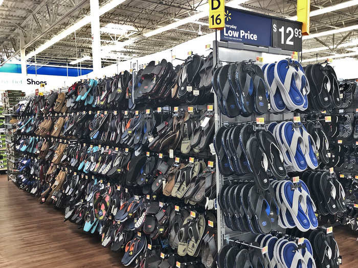 While there were walls and walls of sandals at the Walmart we visited, the ones featured at the head of the aisle were selling for $13 (£10).