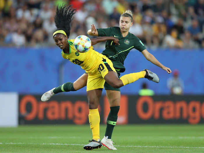 Some of the photos have mesmerizing symmetry, like this photo from the Jamaica vs. Australia match. Steph Catley of Australia and Cheyna Matthews of Jamaica look like they