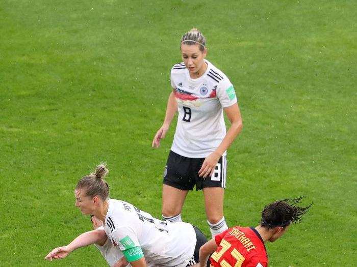 Alexandra Popp of Germany came crashing down over her teammate Marina Hegering after the two collided in their game against Spain.