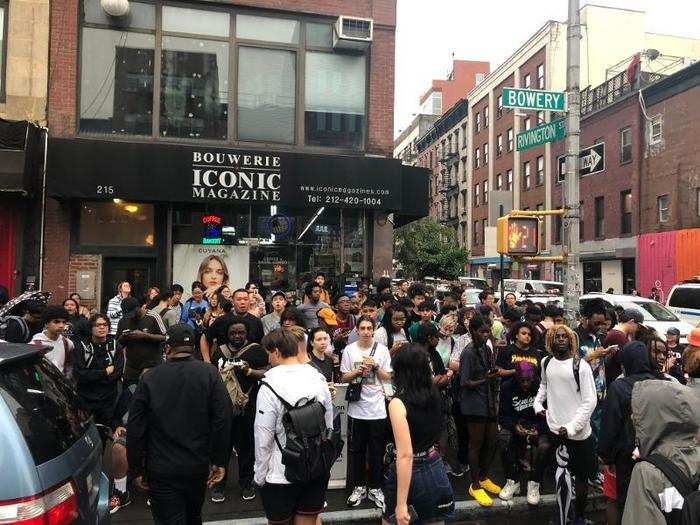 Even though police were saying the event had been shut down, people still appeared to be waiting around to get their sneakers.